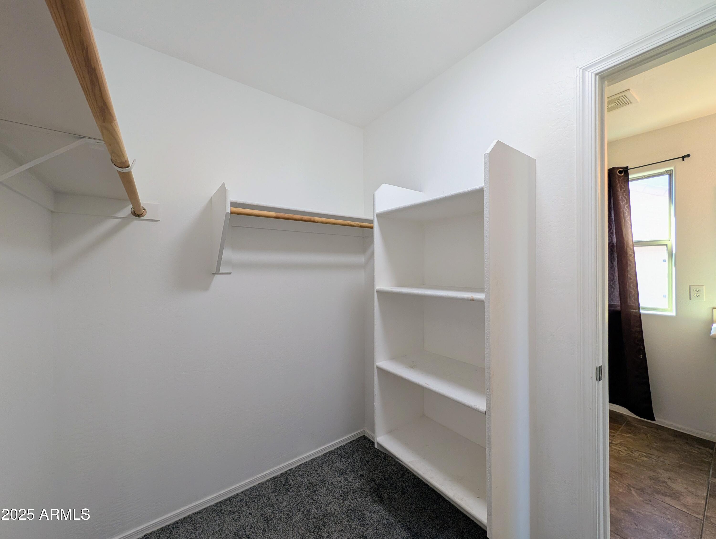 4726 West Fremont Rd. Laveen, AZ 85339 - Photo 35 of 50 a view of an empty walk in closet