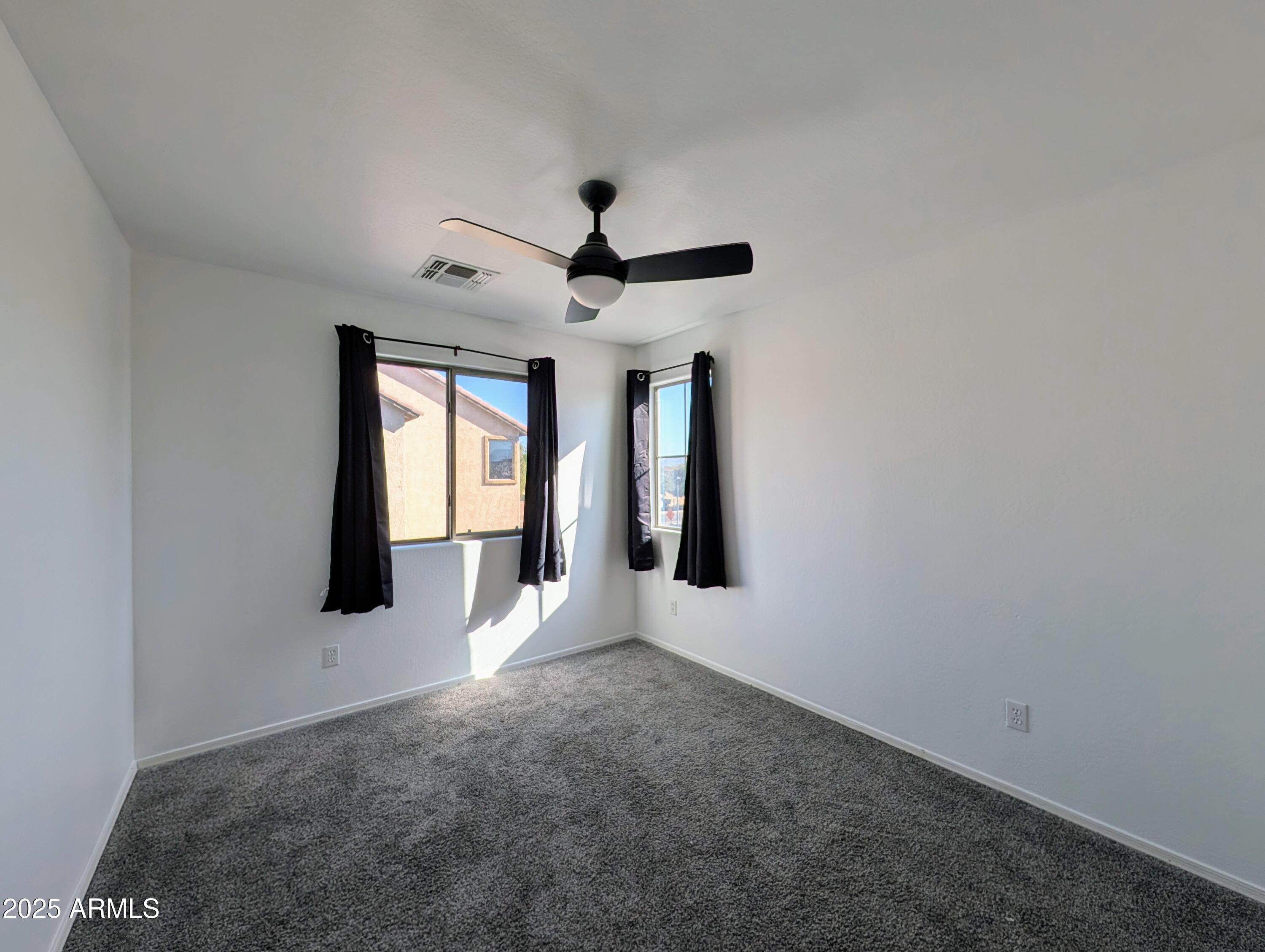 4726 West Fremont Rd. Laveen, AZ 85339 - Photo 38 of 50 a view of an empty room with a window