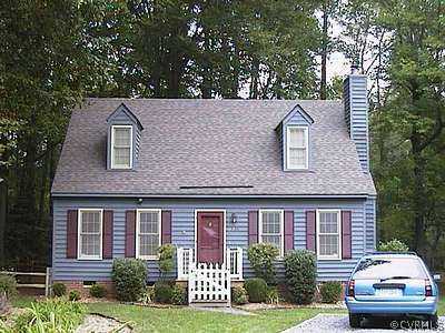 10100 Natural Bridge Road Richmond, VA 23236 - Photo 1 of 1 a front view of a house with a garden