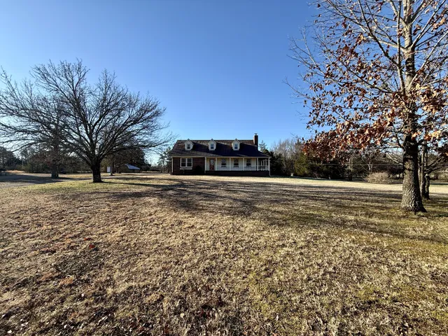 a view of road with trees