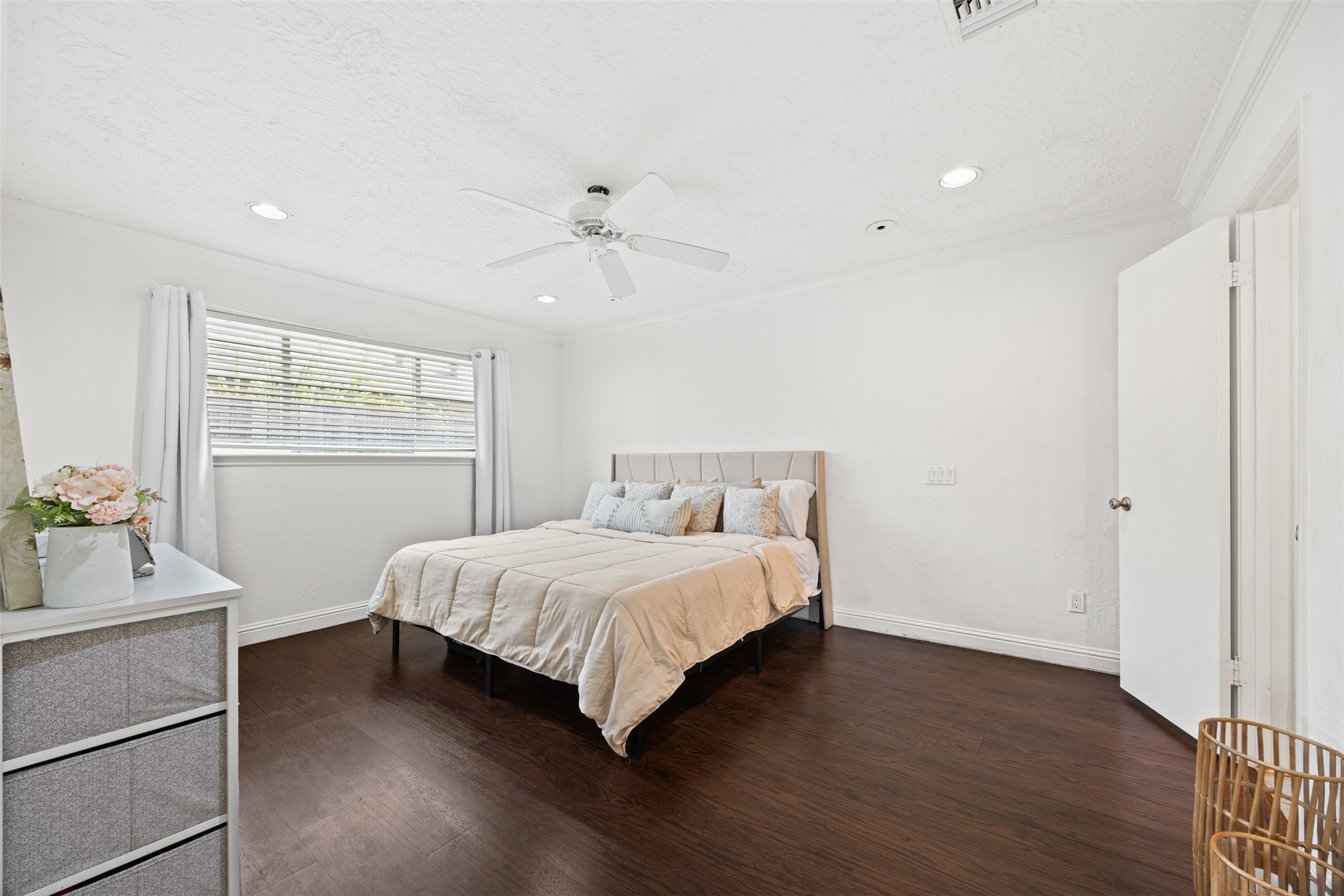 6830 Deer Ridge Lane Houston, TX 77086 - Photo 19 of 24 a bedroom with a bed and a window