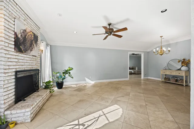 a view of a livingroom with furniture and a fireplace