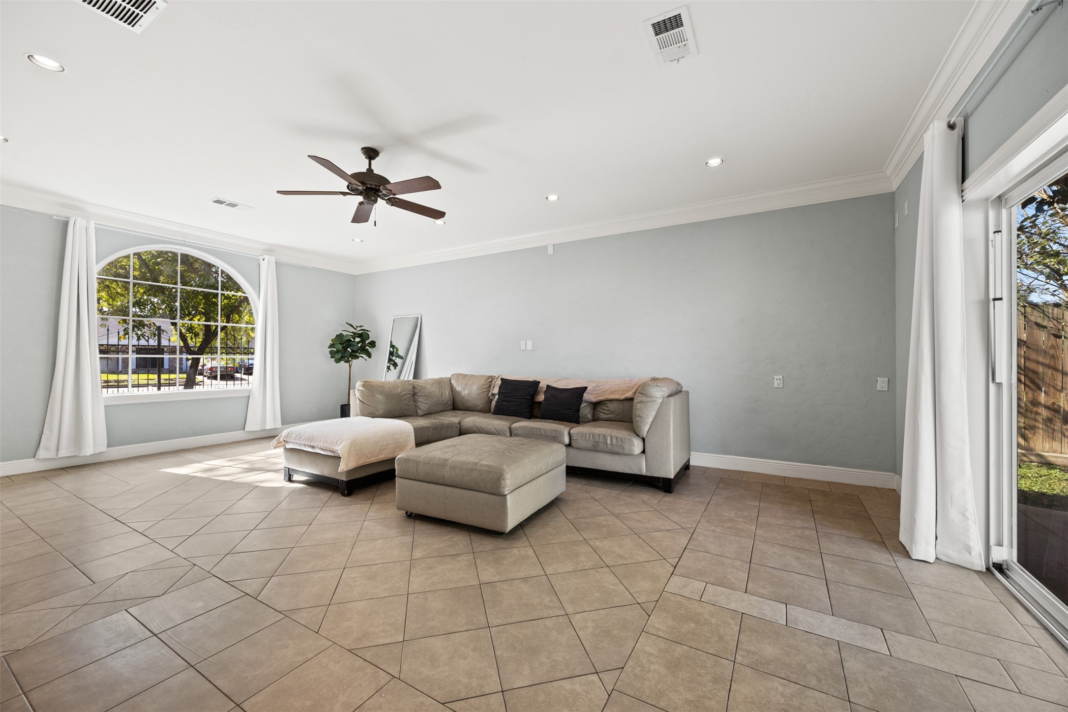 6830 Deer Ridge Lane Houston, TX 77086 - Photo 8 of 24 a living room with furniture and a window