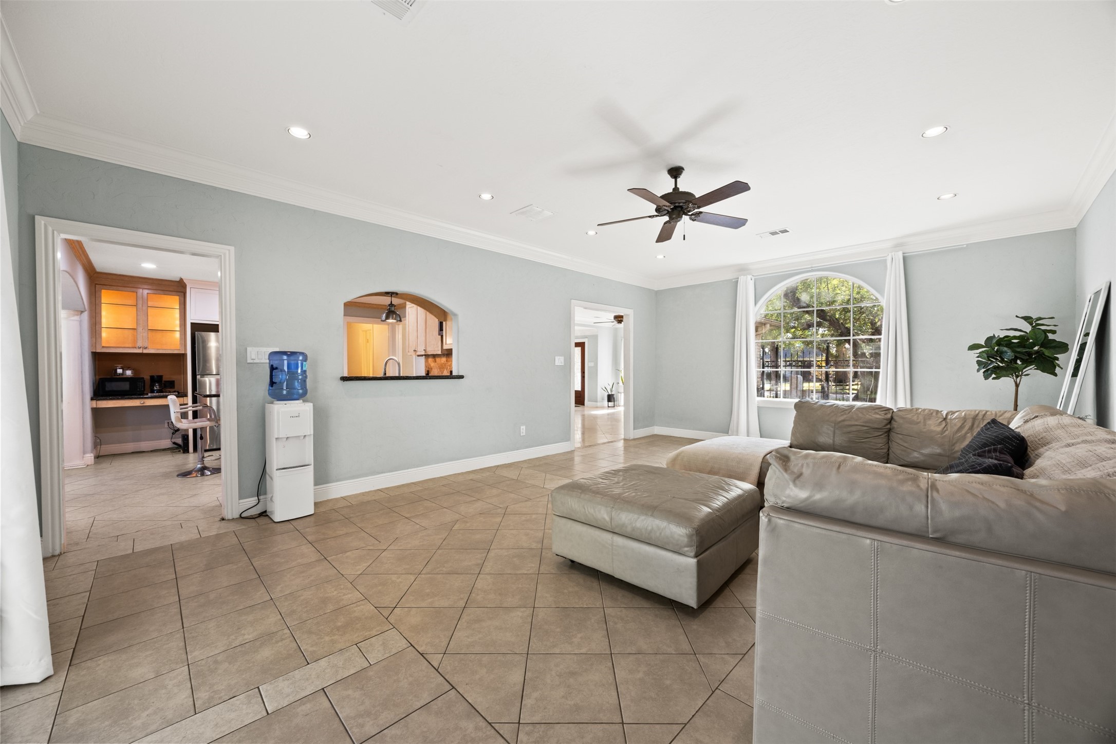 6830 Deer Ridge Lane Houston, TX 77086 - Photo 10 of 24 a living room with furniture and a large window