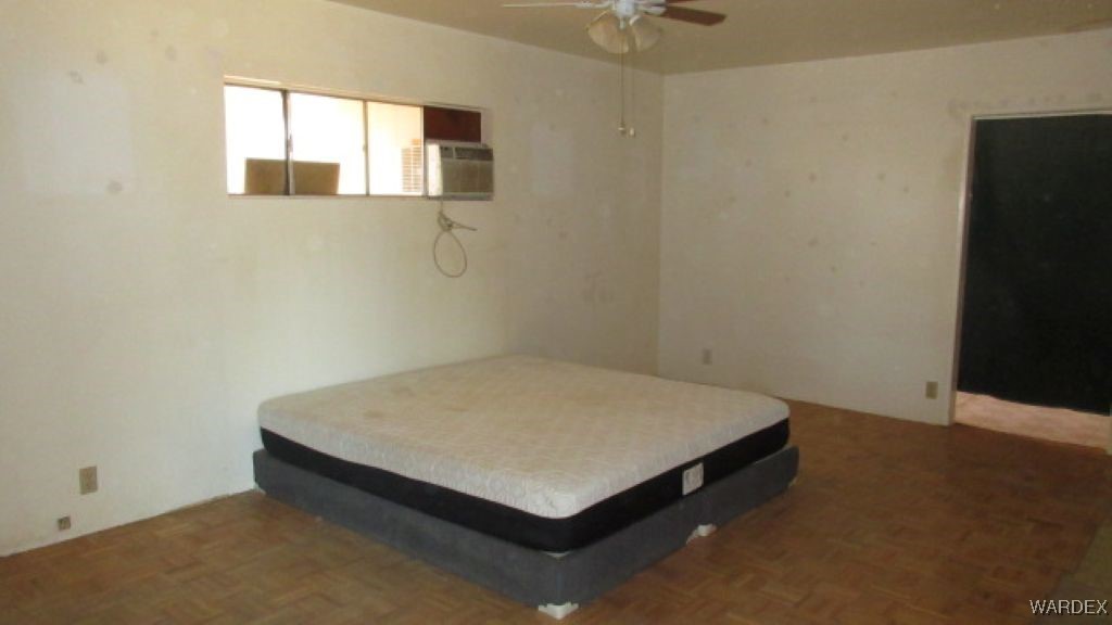 3425 Mobile Road Golden Valley, AZ 86413 - Photo 7 of 22 Master Bedroom