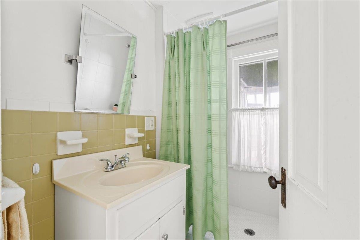 1188 Patterson Mill Road Grottoes, VA 24441 - Photo 15 of 58 a bathroom with a sink a toilet and shower