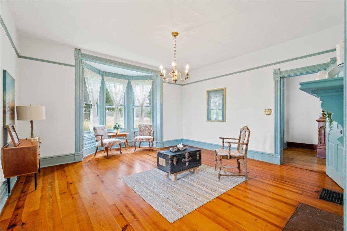 1188 Patterson Mill Road Grottoes, VA 24441 - Photo 19 of 58 a living room with furniture and a wooden floor
