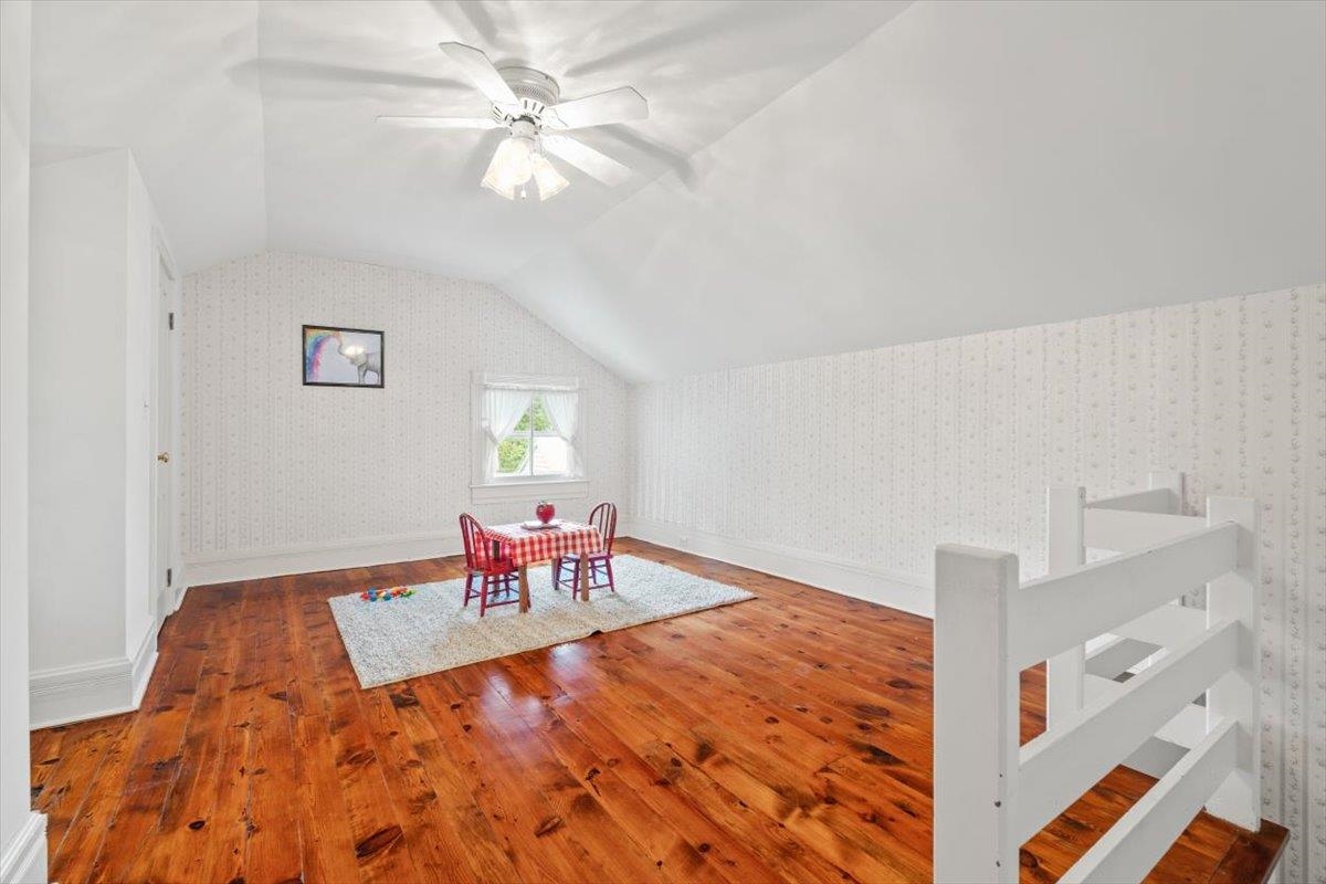 1188 Patterson Mill Road Grottoes, VA 24441 - Photo 35 of 58 a view of a livingroom with furniture and a chandelier fan