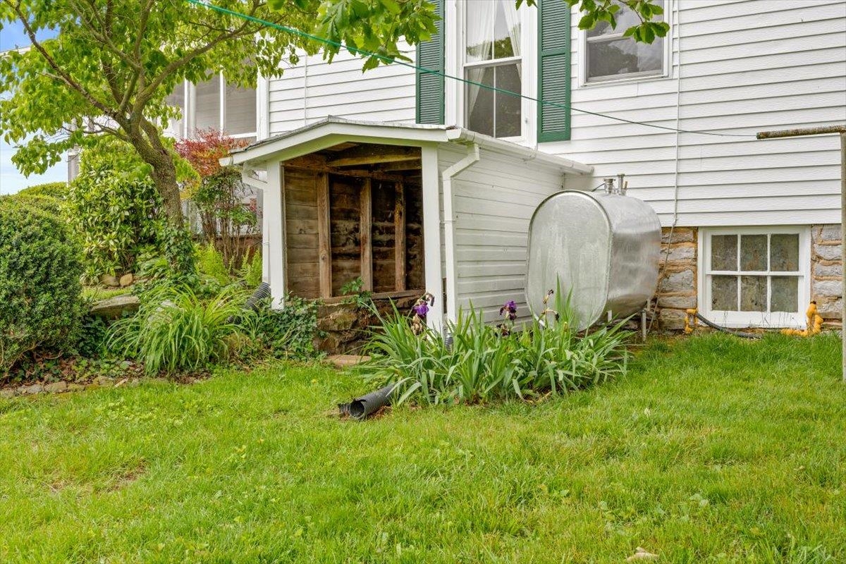 1188 Patterson Mill Road Grottoes, VA 24441 - Photo 54 of 58 a front view of a house with garden