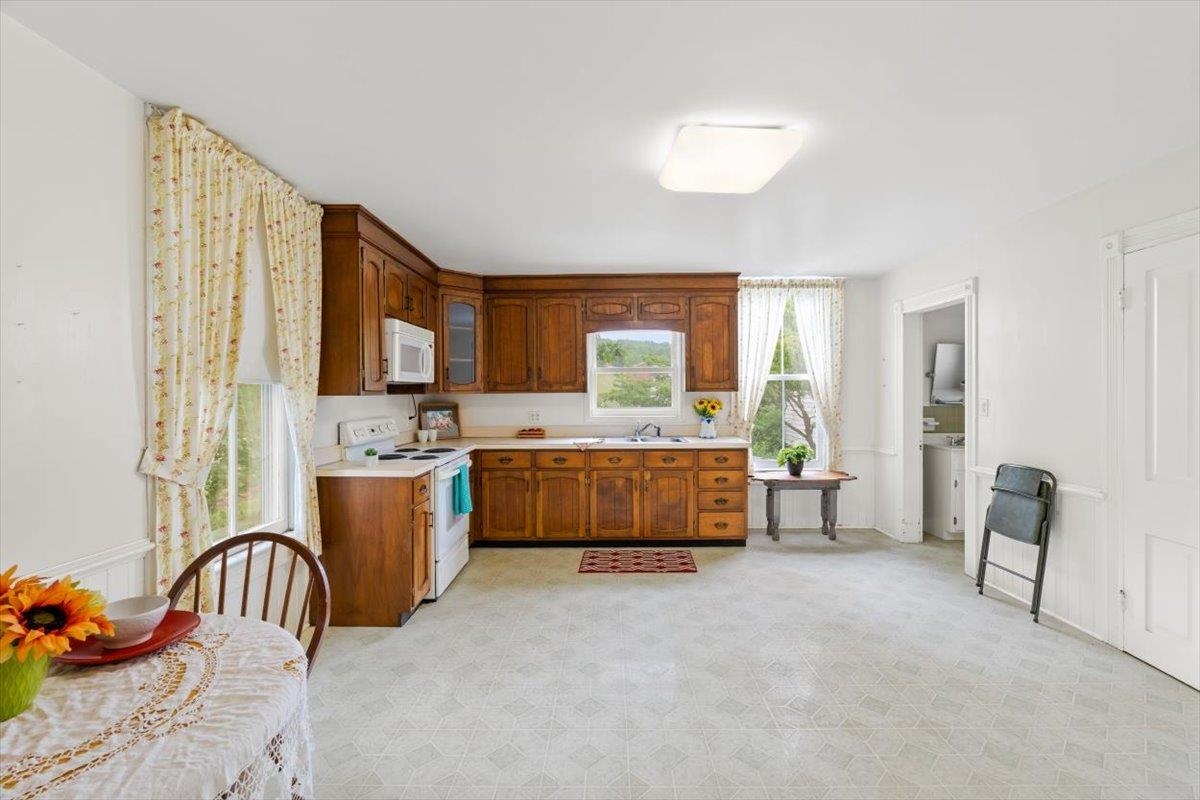 1188 Patterson Mill Road Grottoes, VA 24441 - Photo 10 of 58 a bedroom with furniture and a large window