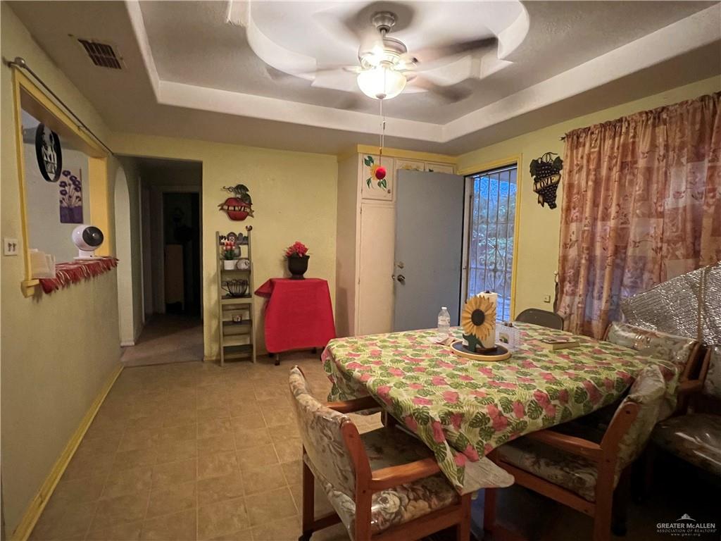 409 South 24th Street Donna, TX 78537 - Photo 5 of 11 a view of a dining room with furniture