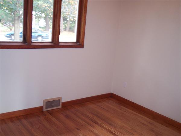 25 Lindsay Road Springfield, MA 01128 - Photo 13 of 30 a view of a room with wooden floor and a window