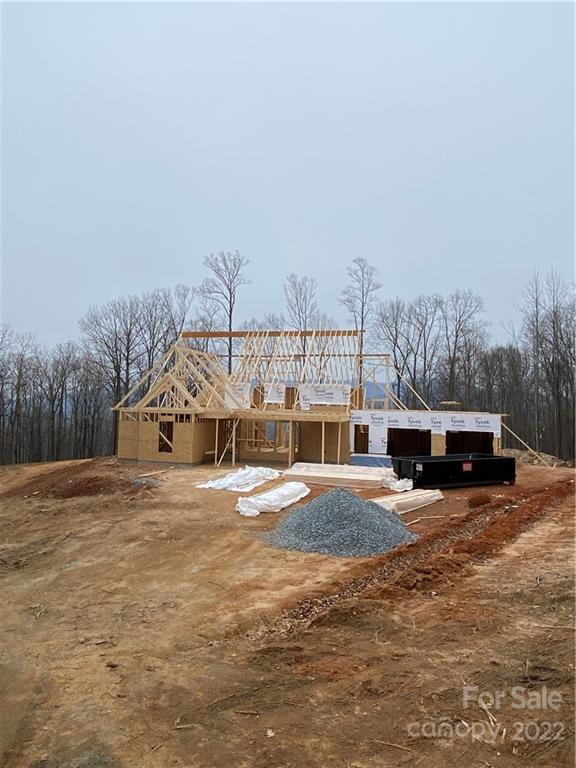 42 Alexander Ridge Way Mill Spring, Unit 118 Mill Spring, NC 28756 - Photo 9 of 35 a view of a house with a yard