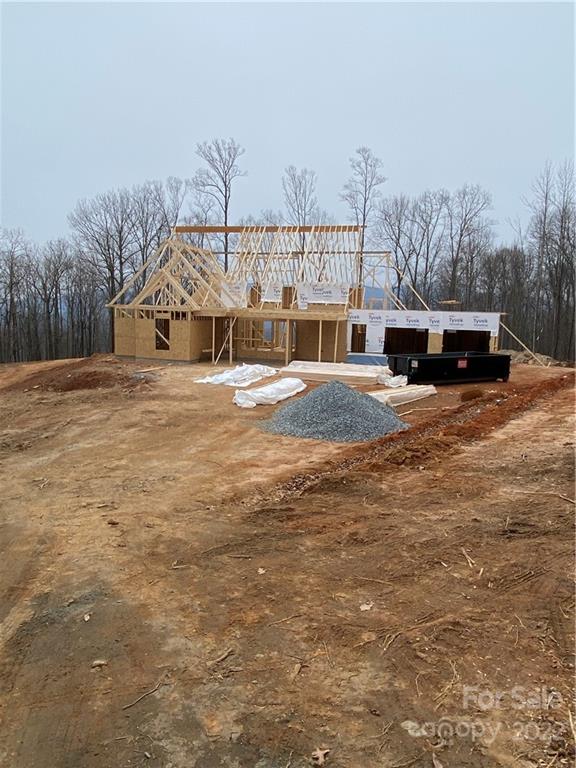 42 Alexander Ridge Way Mill Spring, Unit 118 Mill Spring, NC 28756 - Photo 10 of 35 a view of a house with a yard