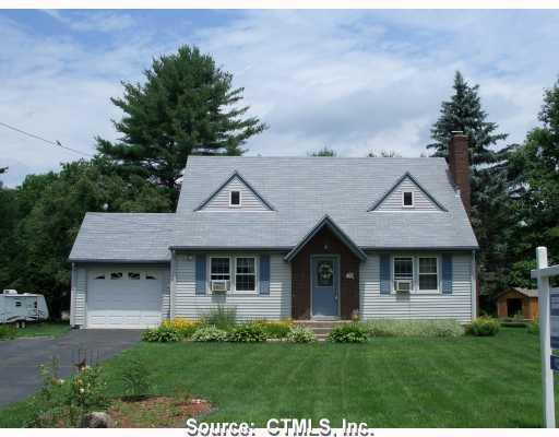 35 Slater Road Tolland, CT 06084 - Photo 1 of 1 a front view of a house with a yard
