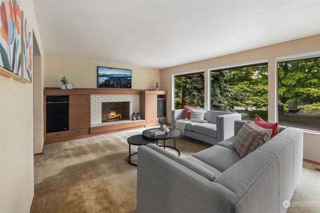 a living room with furniture and a table