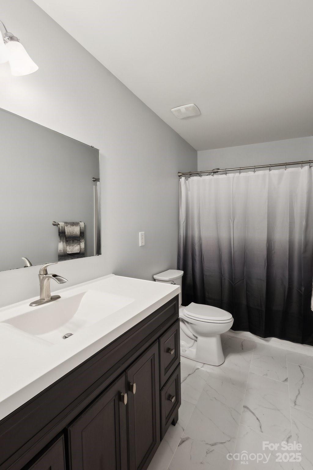 221 Sycamore Creek Road Fort Mill, SC 29708 - Photo 24 of 37 a bathroom with a sink a toilet and shower