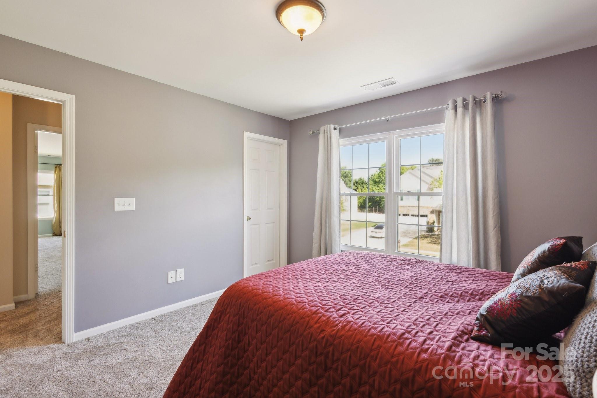221 Sycamore Creek Road Fort Mill, SC 29708 - Photo 29 of 37 a bedroom with a bed and window