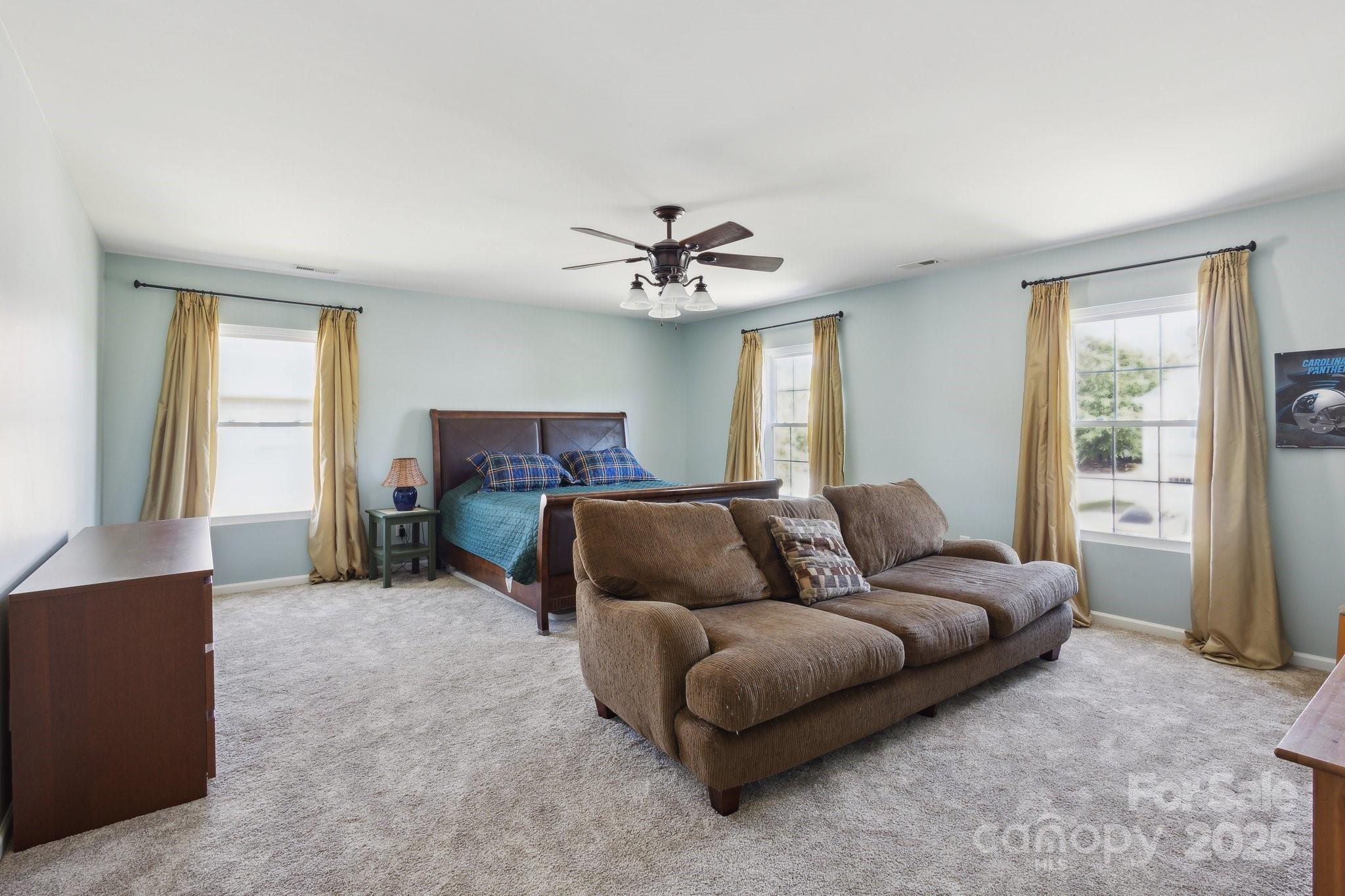 221 Sycamore Creek Road Fort Mill, SC 29708 - Photo 30 of 37 a living room with furniture and a ceiling fan