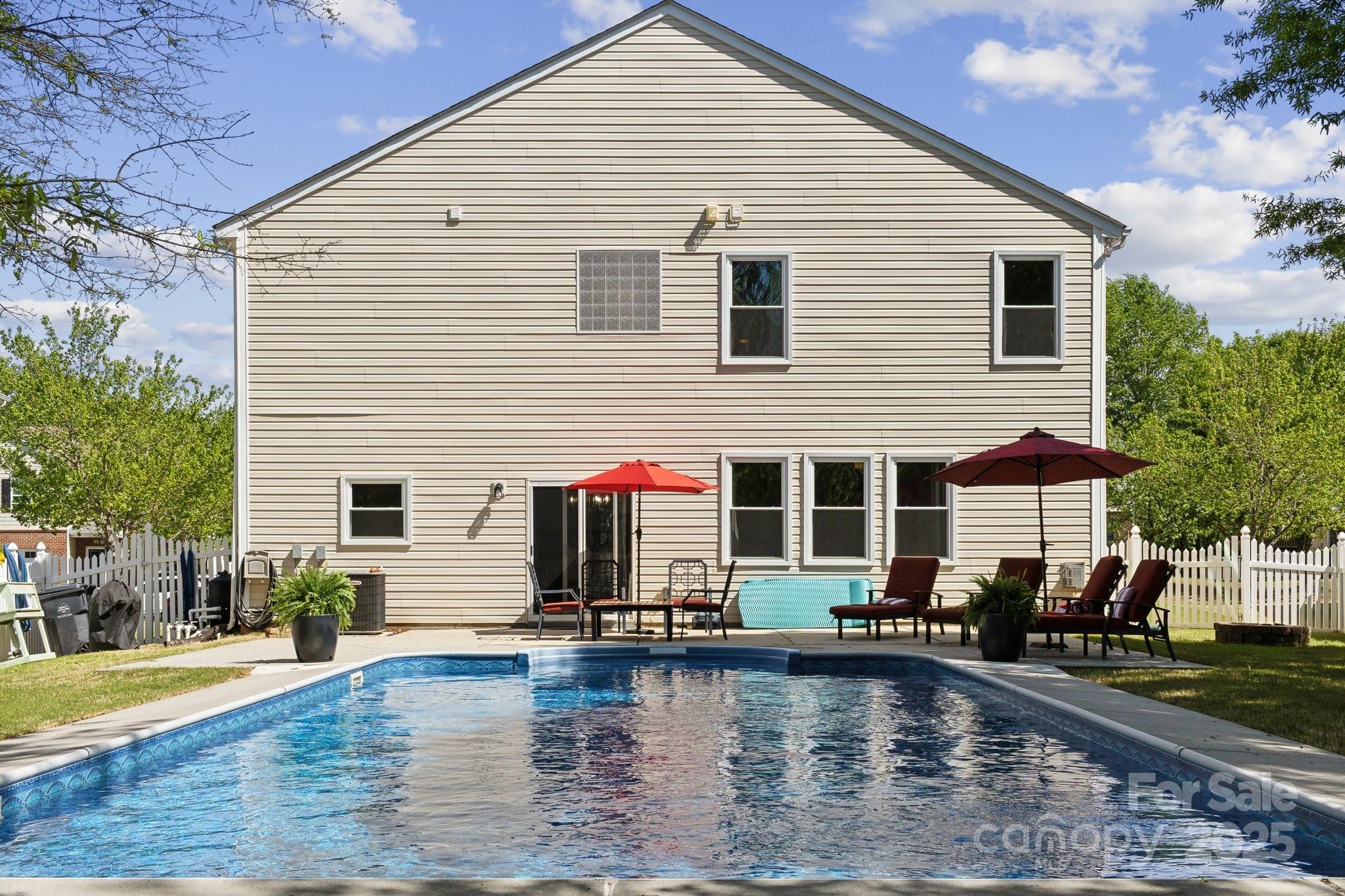 221 Sycamore Creek Road Fort Mill, SC 29708 - Photo 3 of 37 a view of a swimming pool with a patio