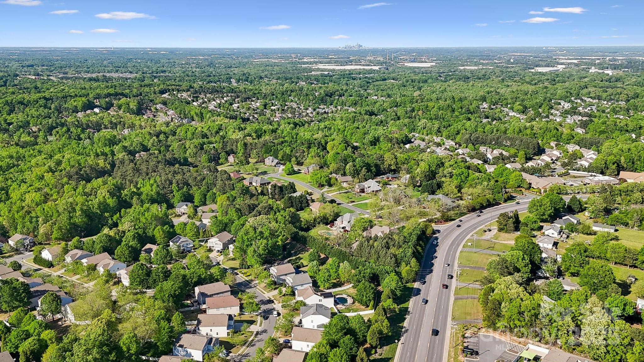 221 Sycamore Creek Road Fort Mill, SC 29708 - Photo 37 of 37 a view of a city with lush green forest