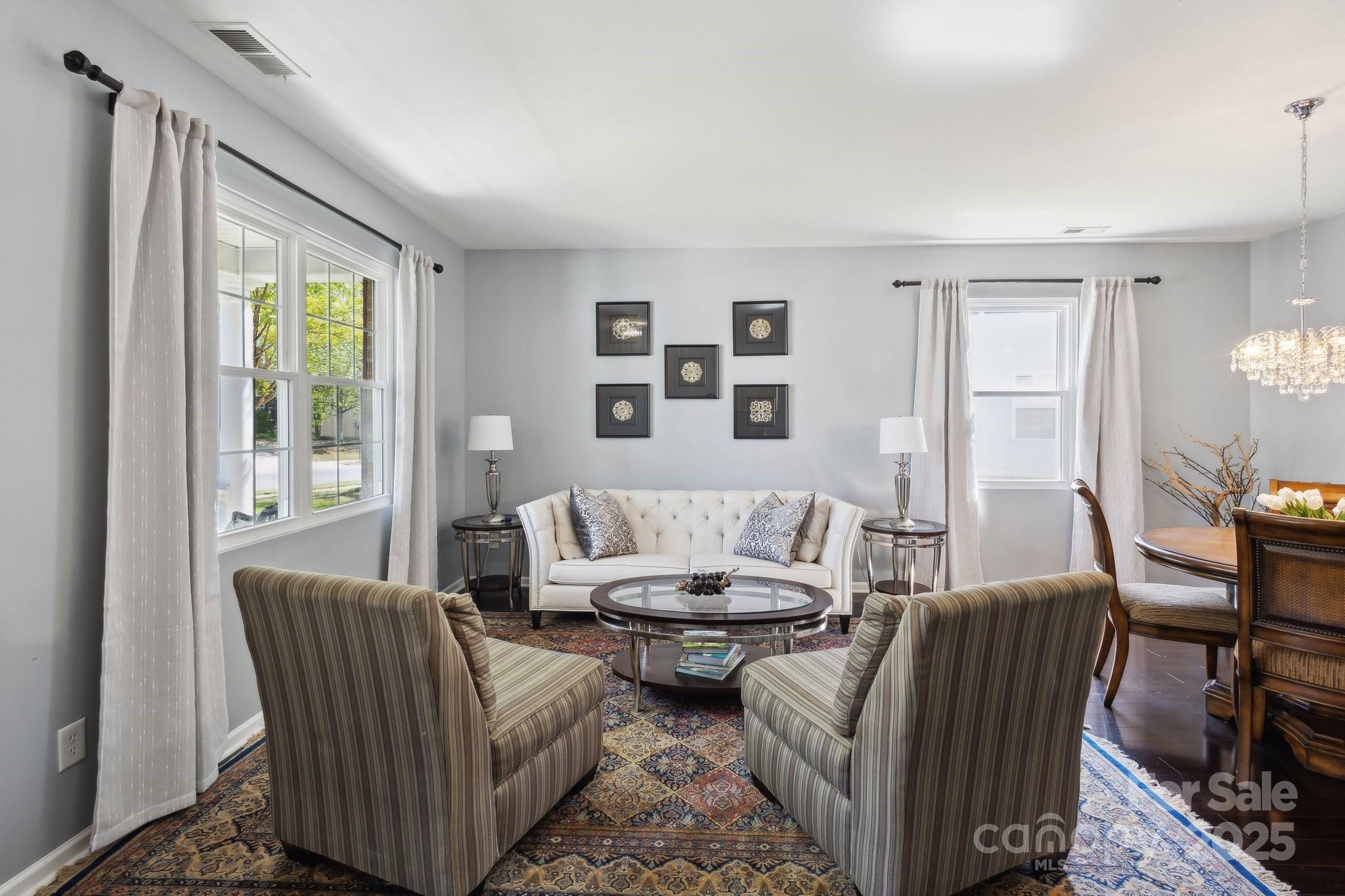 221 Sycamore Creek Road Fort Mill, SC 29708 - Photo 6 of 37 a living room with furniture and wooden floor