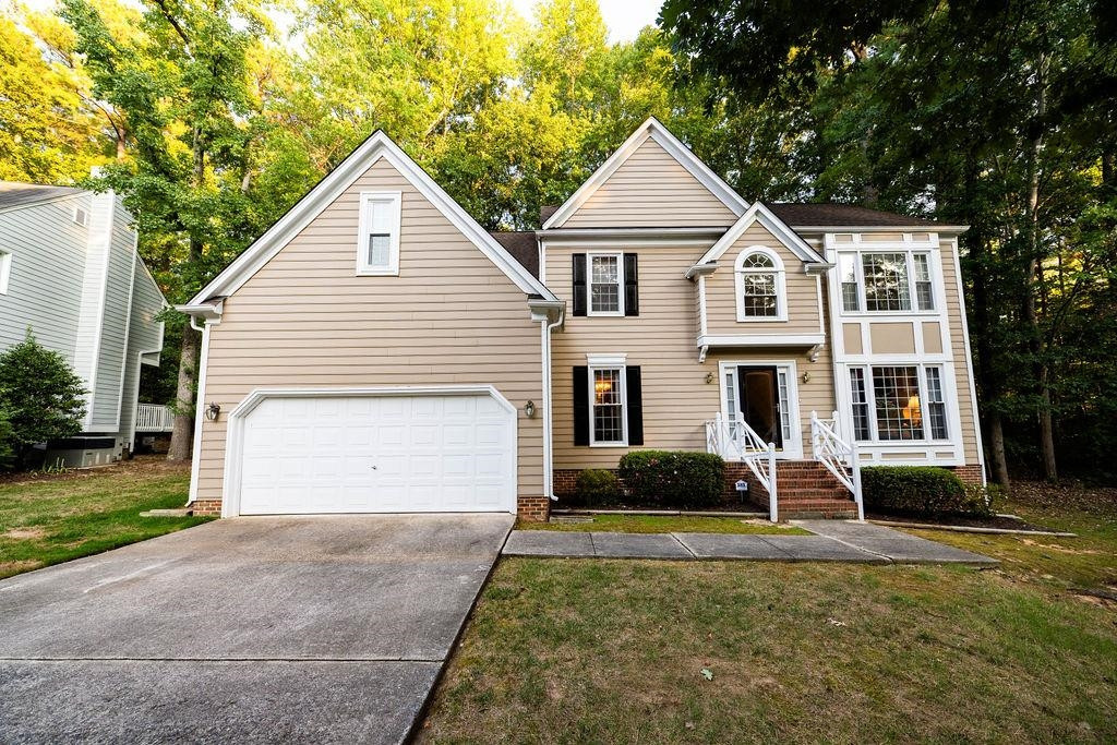 119 Nuttree Way Durham, NC 27713 - Photo 1 of 41 a front view of a house with a yard