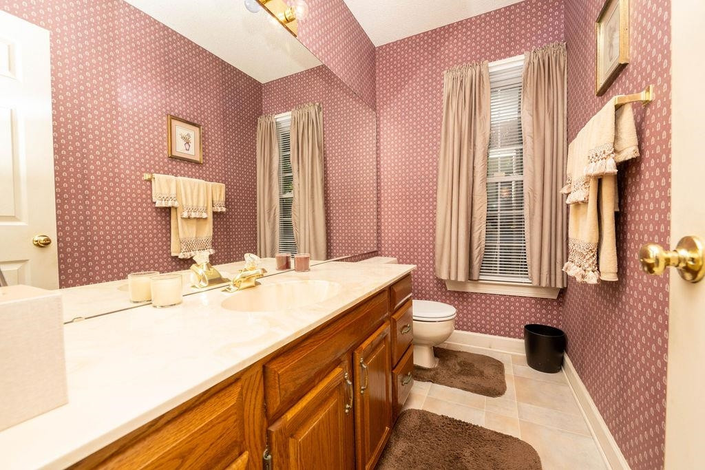 119 Nuttree Way Durham, NC 27713 - Photo 21 of 41 a bathroom with a sink double vanity and a mirror