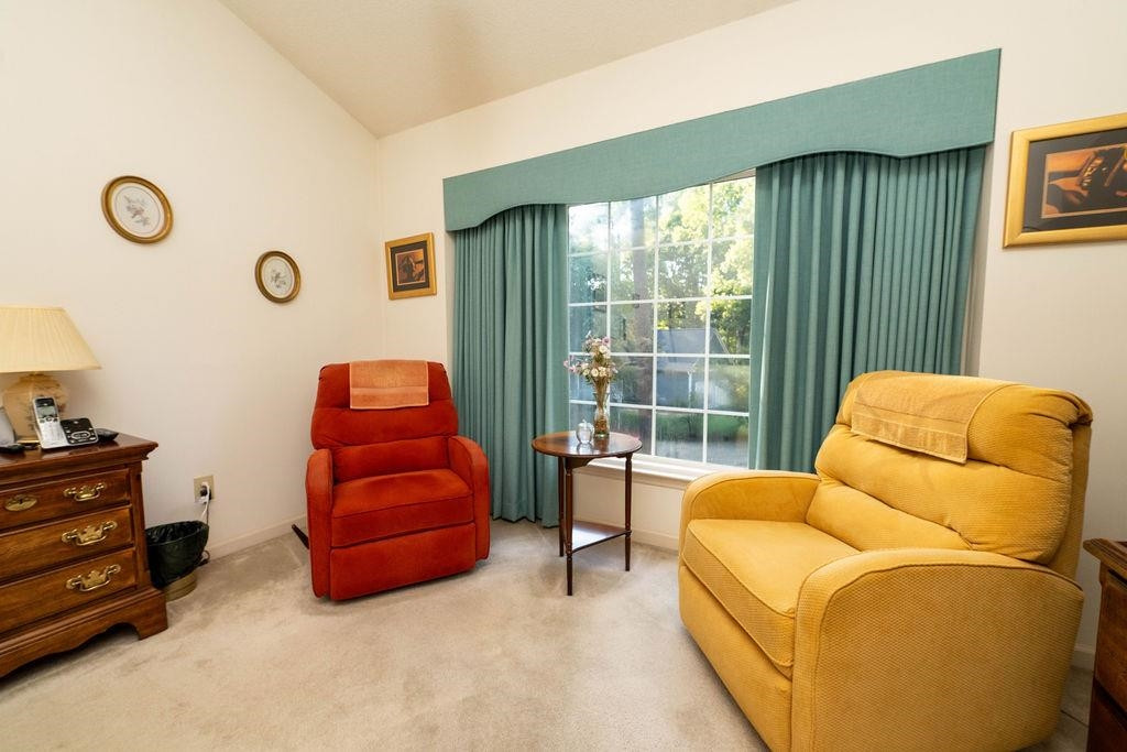 119 Nuttree Way Durham, NC 27713 - Photo 34 of 41 a bedroom with furniture and a large window