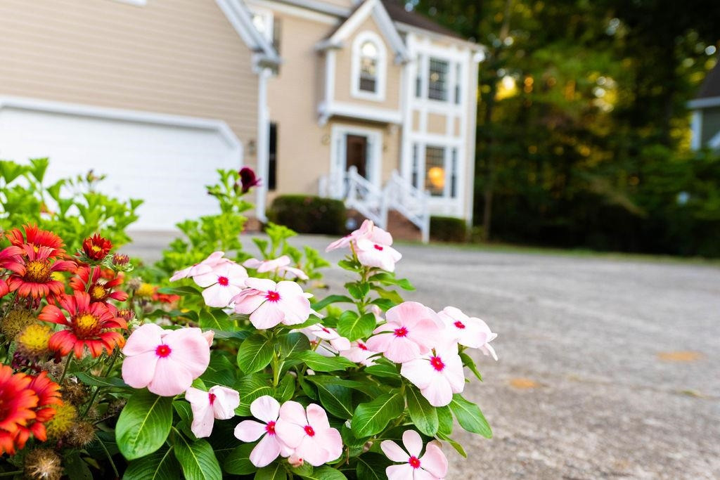 119 Nuttree Way Durham, NC 27713 - Photo 40 of 41 a front view of flower house