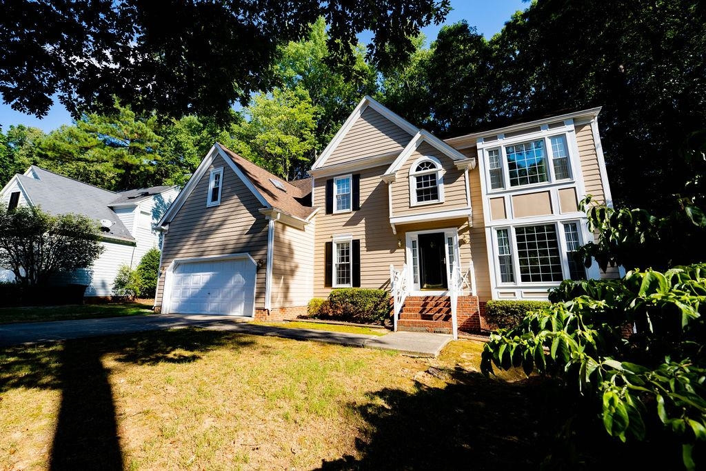 119 Nuttree Way Durham, NC 27713 - Photo 4 of 41 a front view of a house with yard