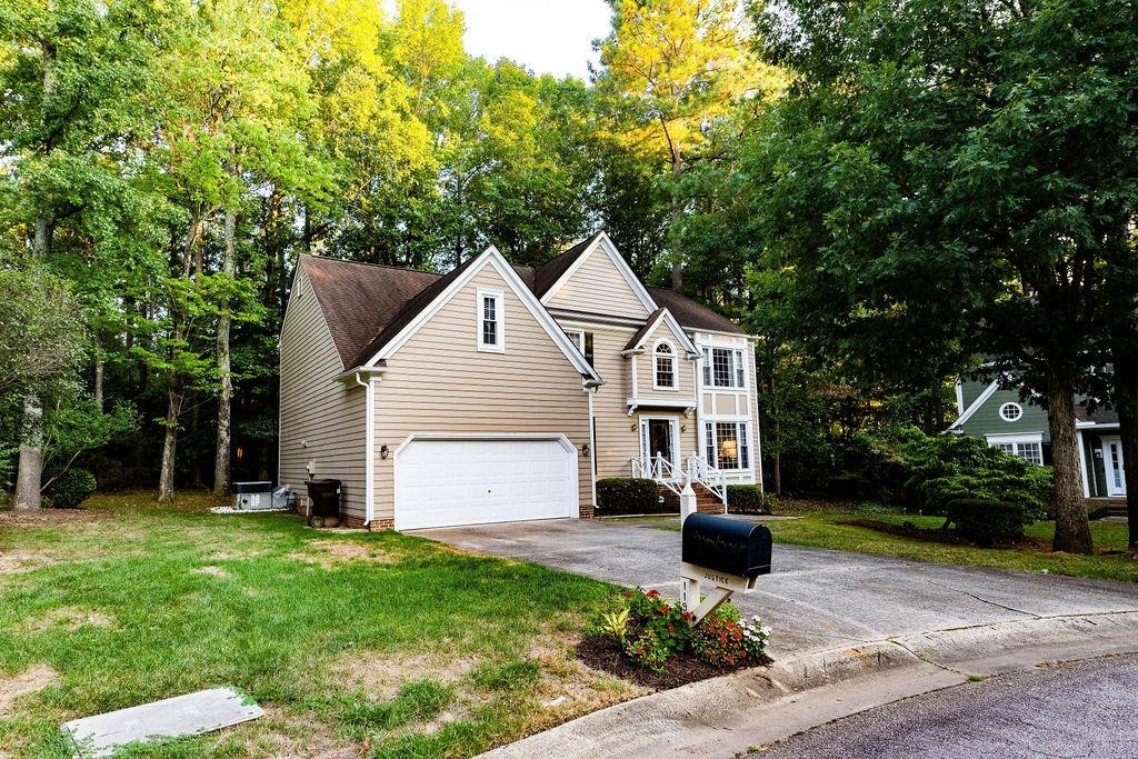 119 Nuttree Way Durham, NC 27713 - Photo 41 of 41 a front view of a house with a yard