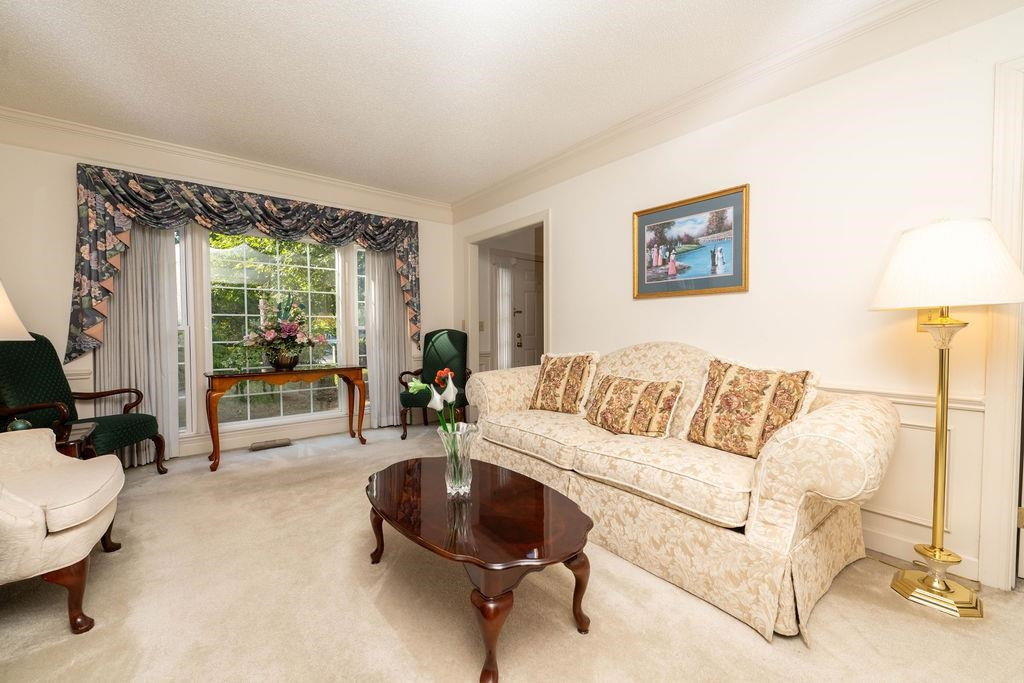 119 Nuttree Way Durham, NC 27713 - Photo 9 of 41 a living room with furniture and a large window