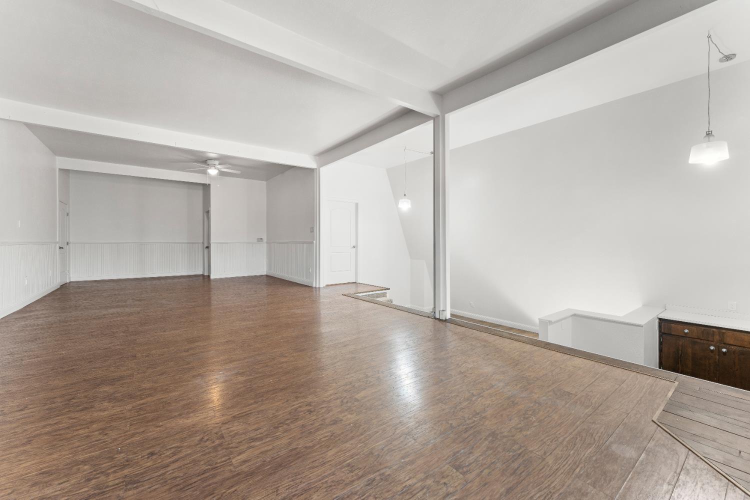 5585 Garden Bar Road, Unit 2 Lincoln, CA 95648 - Photo 14 of 65 a view of an empty room with wooden floor