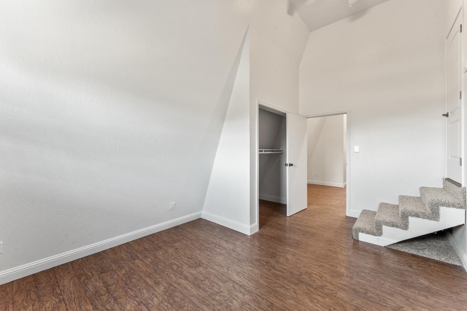 5585 Garden Bar Road, Unit 2 Lincoln, CA 95648 - Photo 16 of 65 a view of an empty room and wooden floor