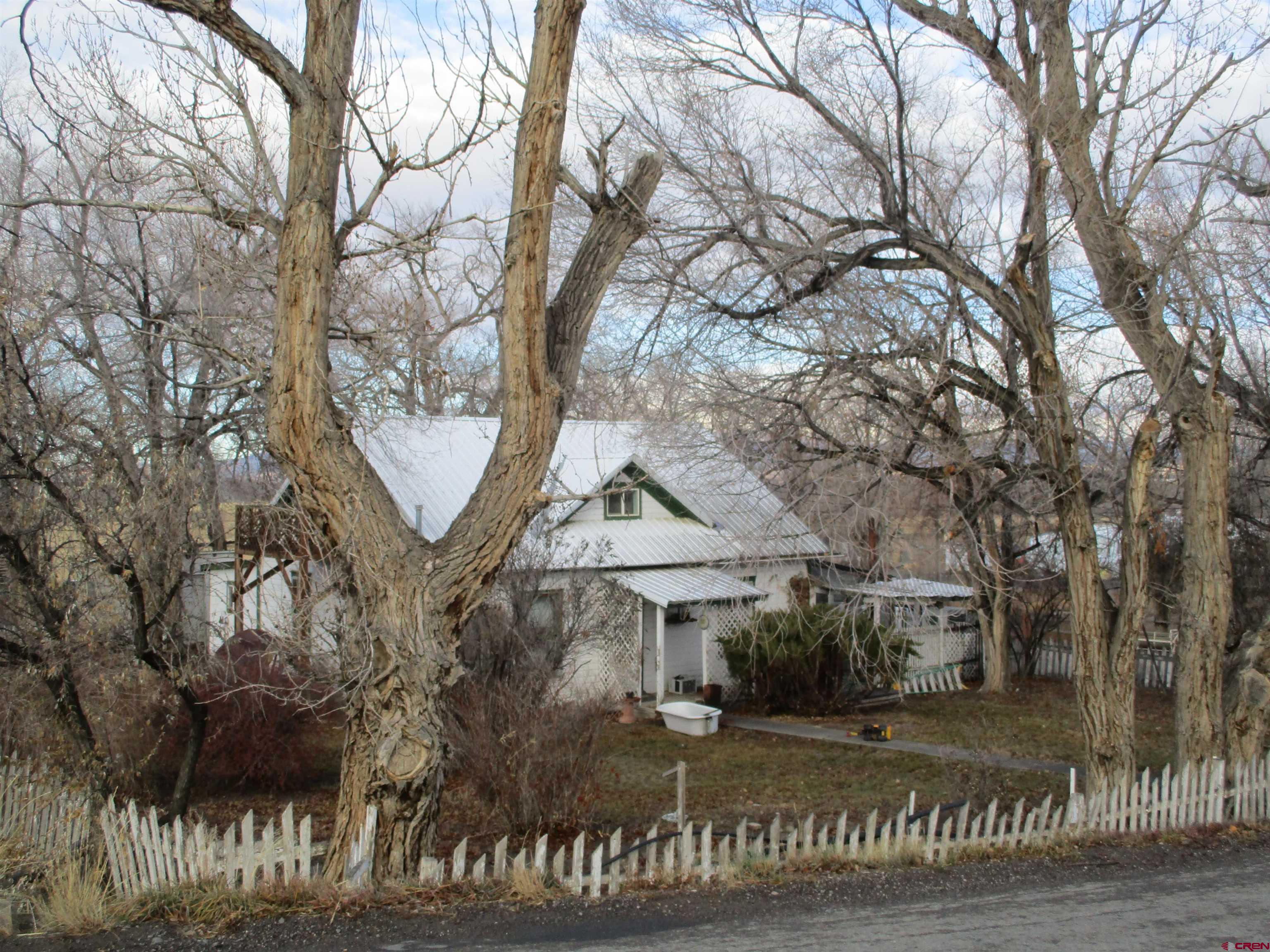 7217 2200th Road Delta, CO 81416 - Photo 1 of 1 a front view of a house with a yard