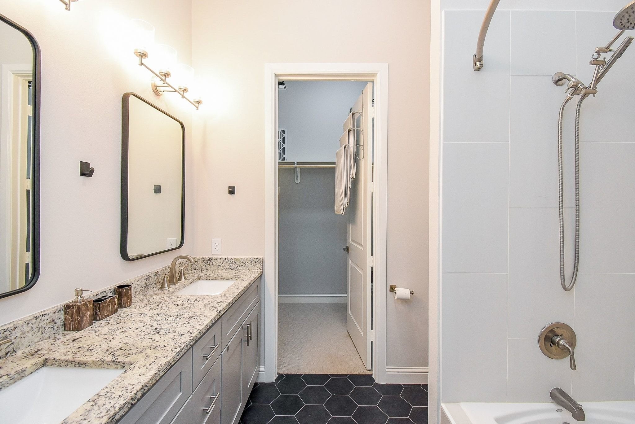 300 St Joseph Parkway, Unit 421 Houston, TX 77002 - Photo 17 of 32 Walk in closet at the end of the master bath off the master bedroom