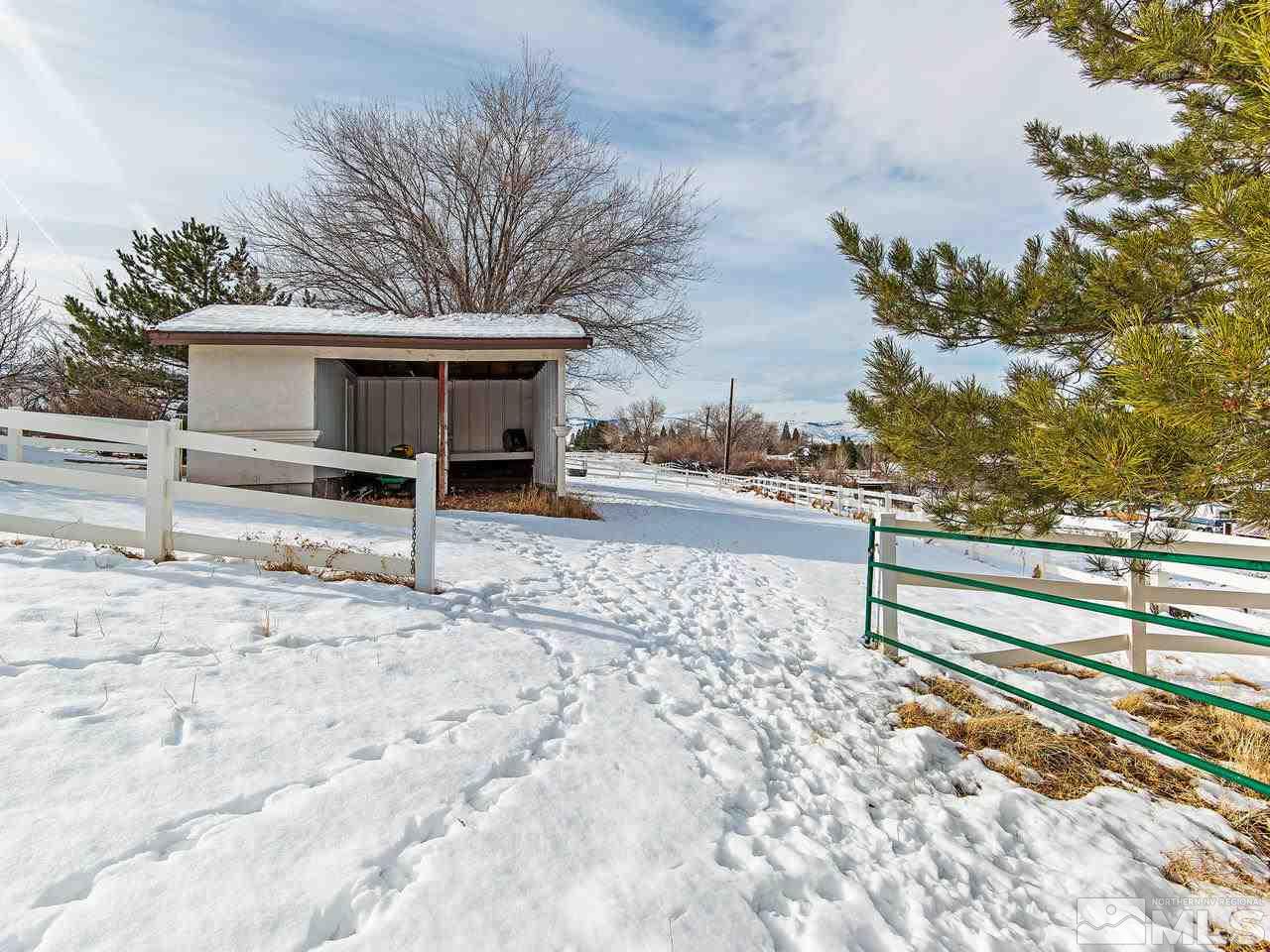 4195 Basque Lane Reno, NV 89519 - Photo 18 of 24 a view of a yard in front of a house