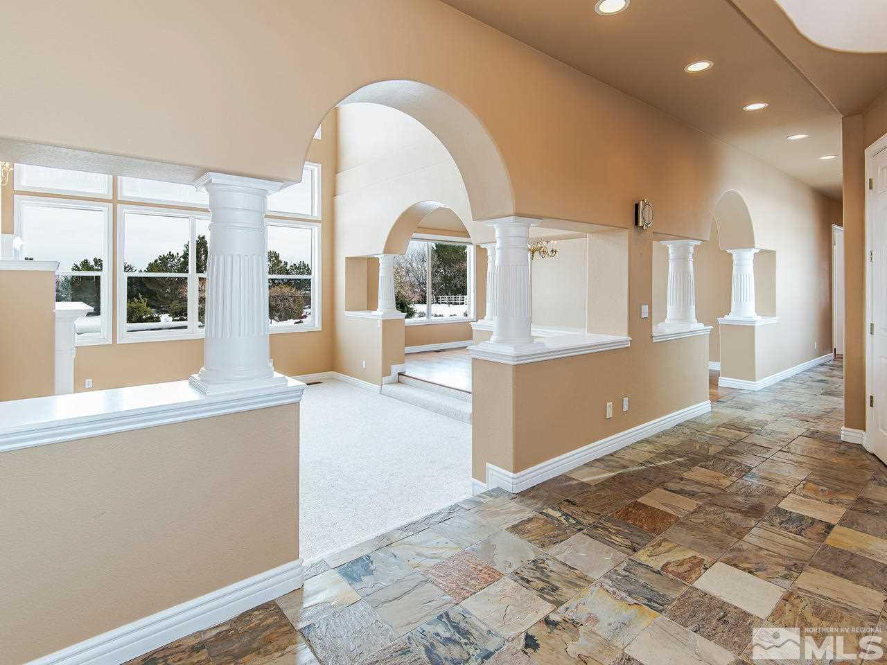 4195 Basque Lane Reno, NV 89519 - Photo 4 of 24 a view of a living room with kitchen