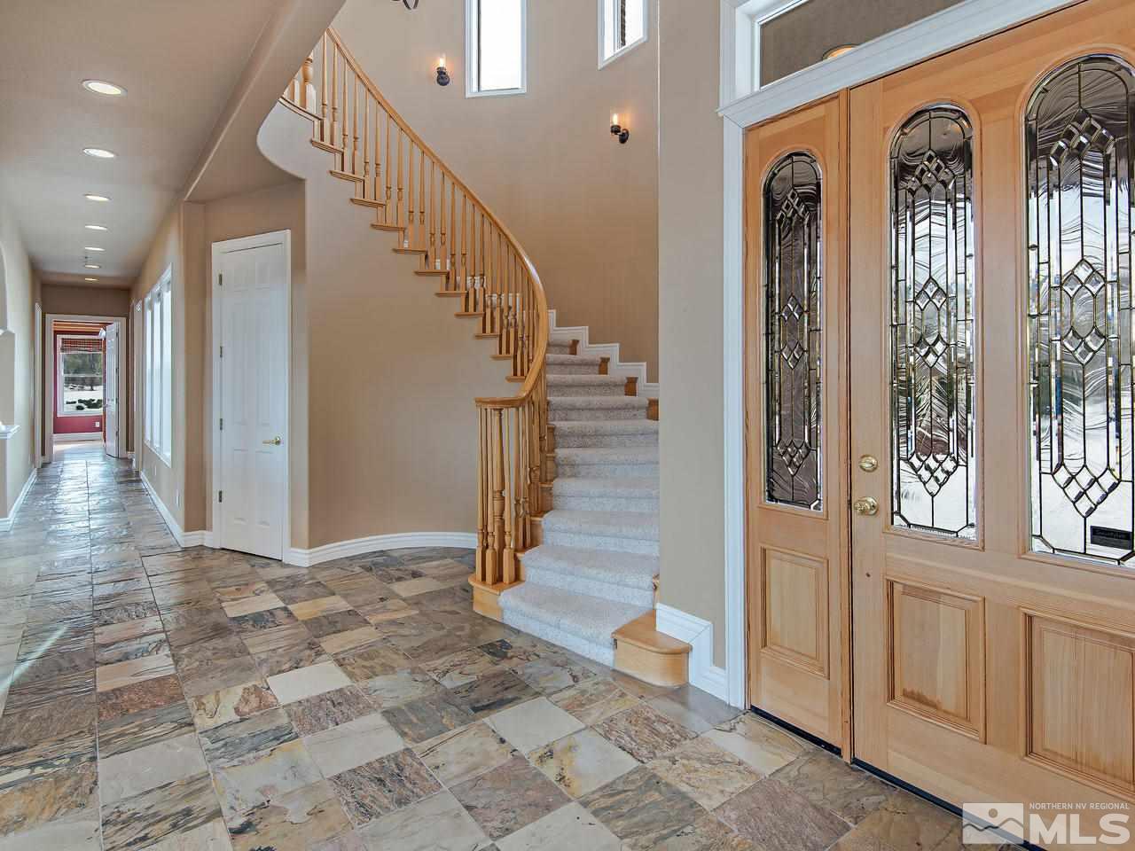 4195 Basque Lane Reno, NV 89519 - Photo 5 of 24 a view of entryway with hallway and wooden floor