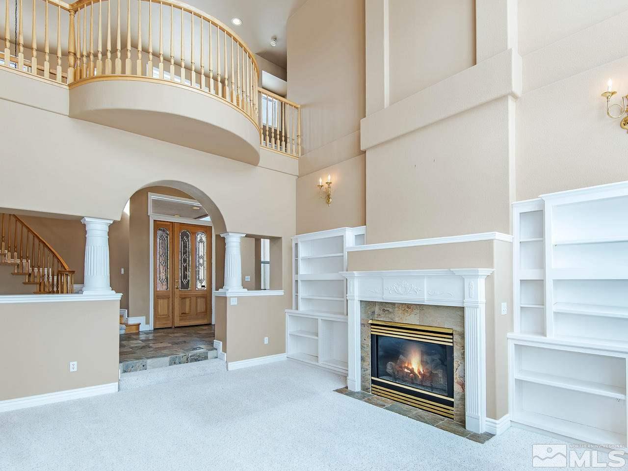 4195 Basque Lane Reno, NV 89519 - Photo 7 of 24 a view of livingroom with furniture and fireplace