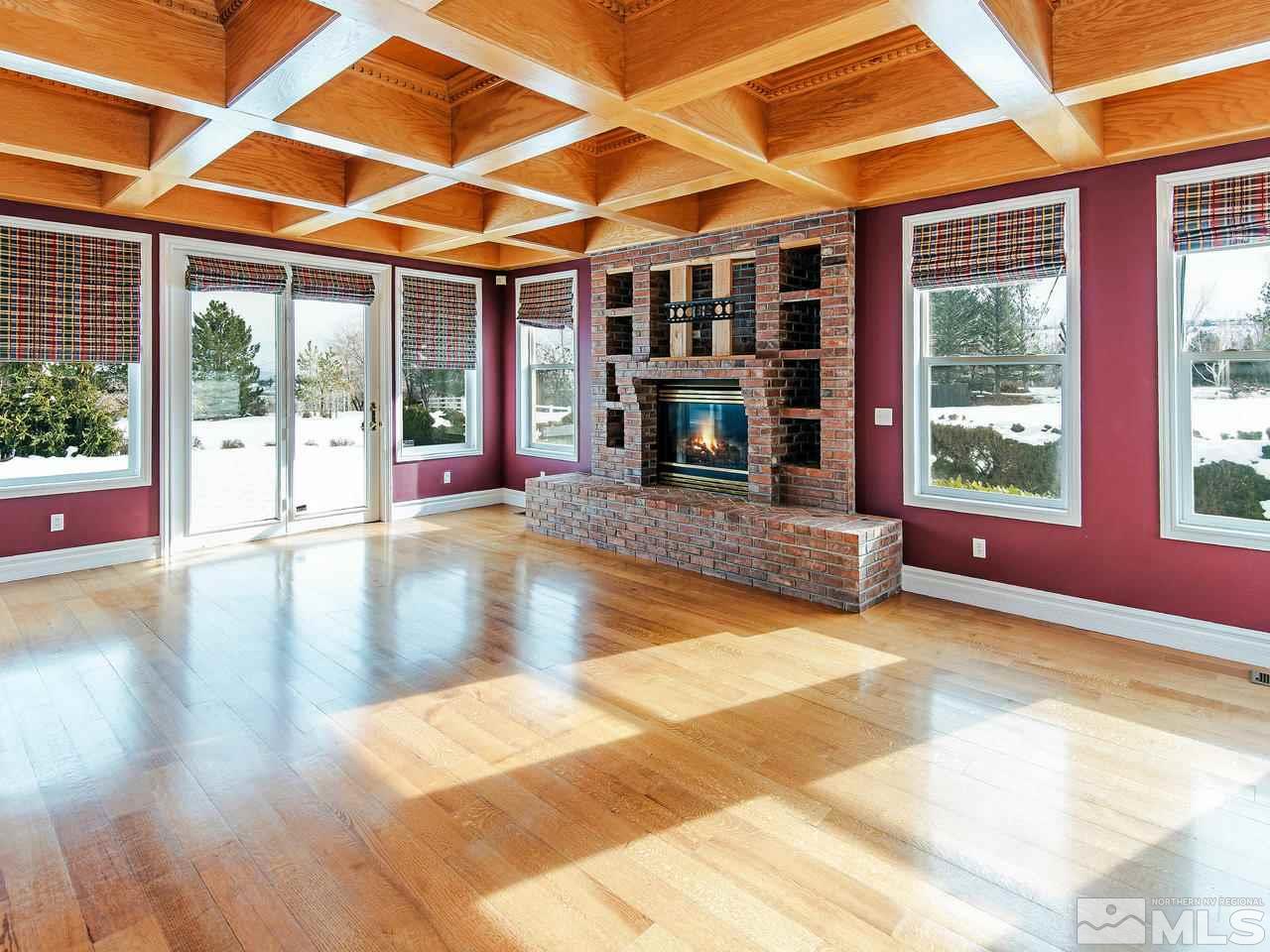 4195 Basque Lane Reno, NV 89519 - Photo 10 of 24 a view of a room with wooden floor and windows