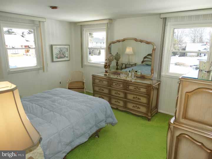 1001 Susan Road Philadelphia, PA 19115 - Photo 11 of 25 a bedroom with a bed and a dresser