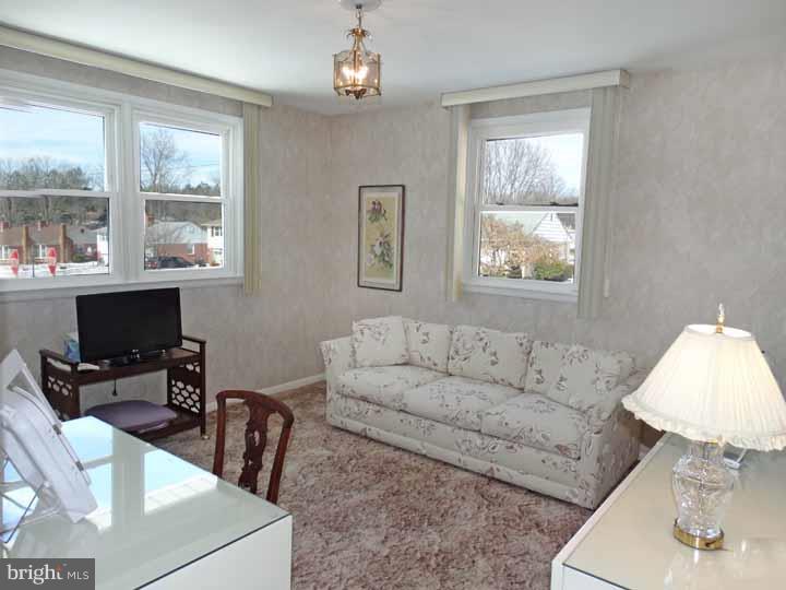 1001 Susan Road Philadelphia, PA 19115 - Photo 14 of 25 a living room with furniture and a window