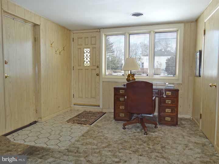 1001 Susan Road Philadelphia, PA 19115 - Photo 18 of 25 a view of a workspace with furniture and a window