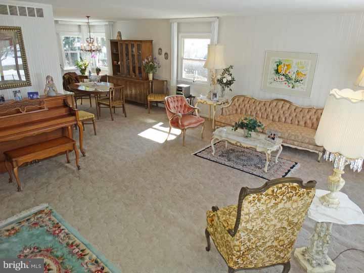 1001 Susan Road Philadelphia, PA 19115 - Photo 5 of 25 a living room with furniture and wooden floor
