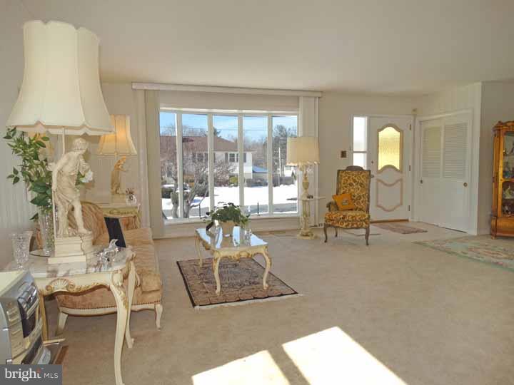 1001 Susan Road Philadelphia, PA 19115 - Photo 6 of 25 a living room with furniture and a table
