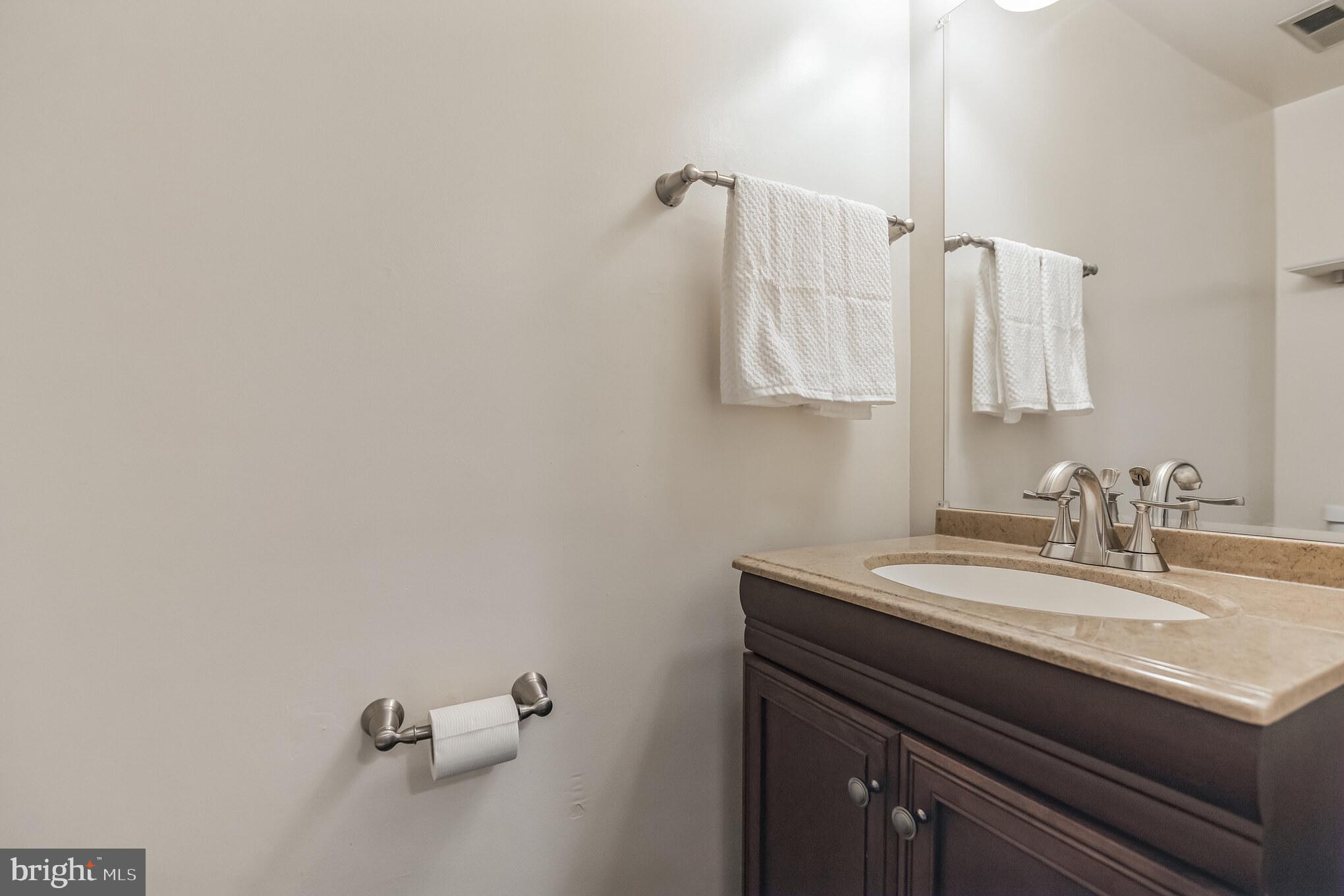 8331 Moline Place Springfield, VA 22153 - Photo 11 of 31 Half bath on the main level