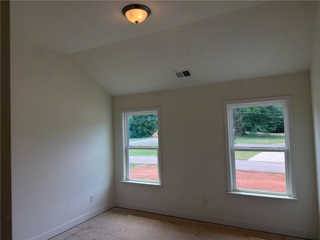 41 Woodland Road Covington, GA 30016 - Photo 14 of 46 a view of a livingroom with a window