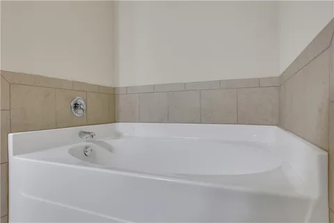 a bathroom with bathtub